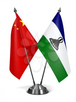 China and Lesotho - Miniature Flags Isolated on White Background.