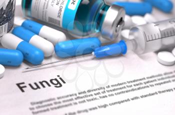 Fungi - Printed Diagnosis with Blurred Text. On Background of Medicaments Composition - Blue Pills, Injections and Syringe.