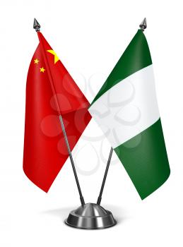 China and Nigeria - Miniature Flags Isolated on White Background.