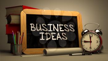 Hand Drawn Business Ideas Concept  on Chalkboard. Blurred Background. Toned Image.