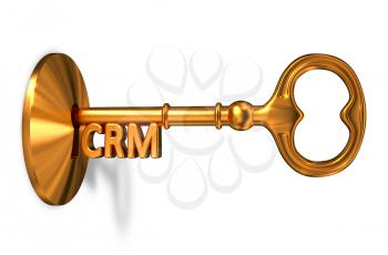 CRM - Customer Relationship Management - Golden Key is Inserted into the Keyhole Isolated on White Background