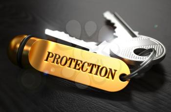 Keys with Word Protection on Golden Label over Black Wooden Background. Closeup View, Selective Focus, 3D Render.