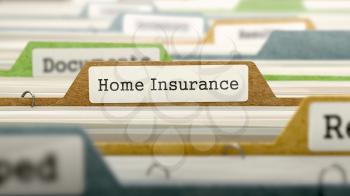 File Folder Labeled as Home Insurance in Multicolor Archive. Closeup View. Blurred Image.