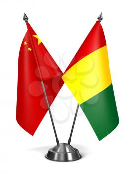 China and Guinea - Miniature Flags Isolated on White Background.