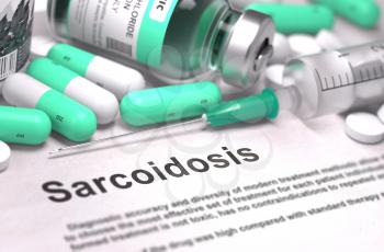 Sarcoidosis - Printed Diagnosis with Blurred Text. On Background of Medicaments Composition - Mint Green Pills, Injections and Syringe.