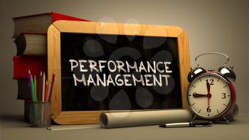 Hand Drawn Performance Management Concept  on Chalkboard. Blurred Background. Toned Image.