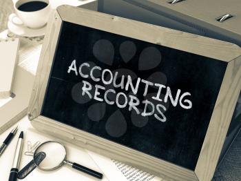Hand Drawn Accounting Records Concept  on Chalkboard. Blurred Background. Toned Image.
