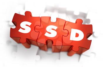 SSD - Solid State Disk - Text on Red Puzzles with White Background. 3D Render. 