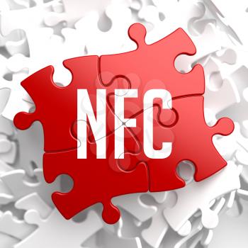NFC on Red Puzzle on White Background.