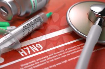 H7N9 Virus on Orange Background and Medical Composition - Stethoscope, Pills and Syringe. Medical Concept. Blurred Image.
