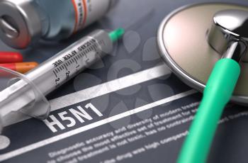 H5N1 - Printed Diagnosis on Grey Background with Blurred Text and Composition of Pills, Syringe and Stethoscope. Medical Concept. Selective Focus. 