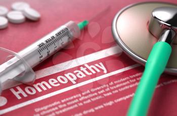 Homeopathy - Medical Concept with Blurred Text on Red Background and Medical Composition - Stethoscope, Pills and Syringe. 