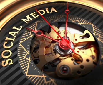 Social Media on Black-Golden Watch Face with Closeup View of Watch Mechanism.