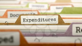 File Folder Labeled as Expenditures in Multicolor Archive. Closeup View. Blurred Image.
