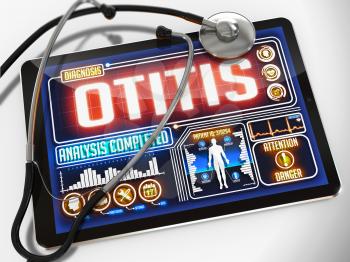 Otitis - Diagnosis on the Display of Medical Tablet and a Black Stethoscope on White Background.
