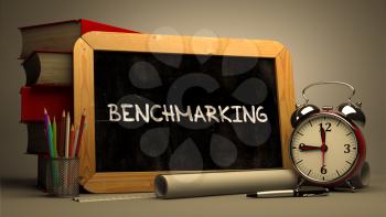 Hand Drawn Benchmarking Concept  on Chalkboard. Blurred Background. Toned Image.