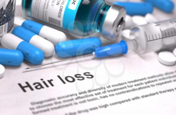 Hair Loss. Medical Concept with Blue Pills, Injections and Syringe. Selective Focus. Blurred Background.