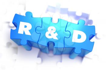 Research and Development  - Text on Blue Puzzles on White Background. 3D Render. 