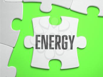 Energy - Jigsaw Puzzle with Missing Pieces. Bright Green Background. Close-up. 3d Illustration.