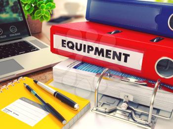 Equipment - Red Office Folder on Background of Working Table with Stationery, Laptop and Reports. Business Concept on Blurred Background. Toned Image.