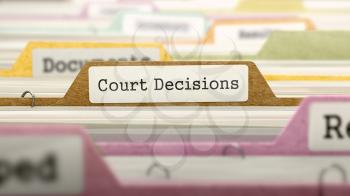 Court Decisions - Folder Register Name in Directory. Colored, Blurred Image. Closeup View.