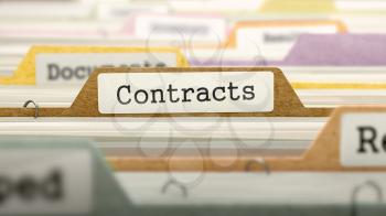 Contracts Concept on File Label in Multicolor Card Index. Closeup View. Selective Focus. 