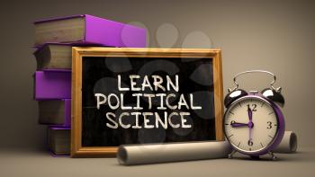 Learn Political Science. Inspirational Quote Hand Drawn on Chalkboard. Blurred Background. Toned Image.