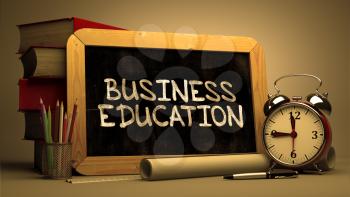 Hand Drawn Business Education Concept  on Chalkboard. Blurred Background. Toned Image.
