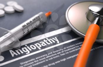 Angiopathy - Printed Diagnosis with Blurred Text on Grey Background and Medical Composition - Stethoscope, Pills and Syringe. Medical Concept.