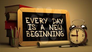 Inspirational Quote - Every Day is a New Beginning on Chalkboard. Blurred Background. Toned Image.