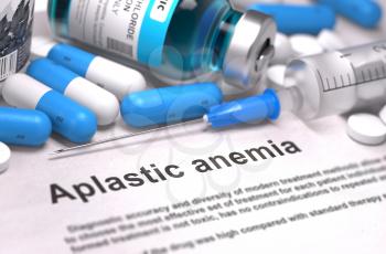 Aplastic Anemia - Printed Diagnosis with Blue Pills, Injections and Syringe. Medical Concept with Selective Focus.