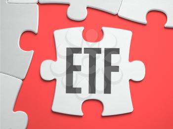 ETF - Exchange Traded Fund - Text on Puzzle on the Place of Missing Pieces. Scarlett Background. Close-up. 3d Illustration.