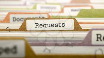 File Folder Labeled as Requests. in Multicolor Archive. Closeup View. Blurred Image.