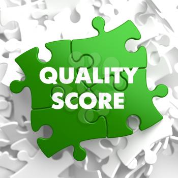 Quality Score on Green Puzzle on White Background.