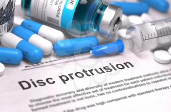 Disc Protrusion - Printed Diagnosis with Blue Pills, Injections and Syringe. Medical Concept with Selective Focus.