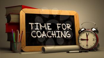 Hand Drawn Time for Coaching Concept  on Chalkboard. Blurred Background. Toned Image.