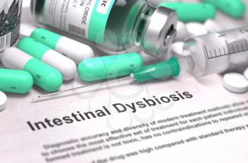 Intestinal Dysbiosis. Medical Report with Composition of Medicaments - Light Green Pills, Injections and Syringe. Blurred Background with Selective Focus.