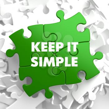 Keep it Simple on Green Puzzle on White Background.