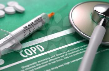 COPD - Medical Concept with Blurred Text, Stethoscope, Pills and Syringe on Green Background. Selective Focus. 3d Render.