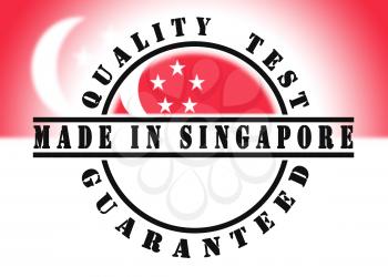 Quality test guaranteed stamp with a national flag inside, Singapore