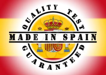Quality test guaranteed stamp with a national flag inside, Spain
