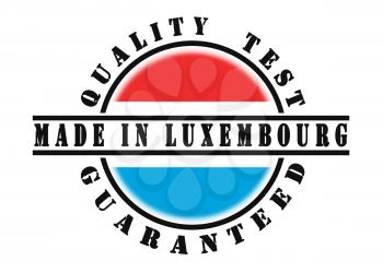 Quality test guaranteed stamp with a national flag inside, Luxembourg