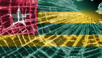 Broken ice or glass with a flag pattern, isolated, Togo