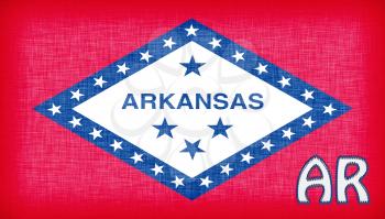 Linen flag of the US state of Arkansas with it's abbreviation stitched on it