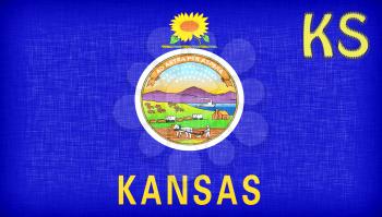 Linen flag of the US state of Kansas with it's abbreviation stitched on it