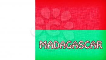 Flag of Madagascar stitched with letters, isolated