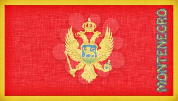 Linen flag of Montenegro with letters stiched on it