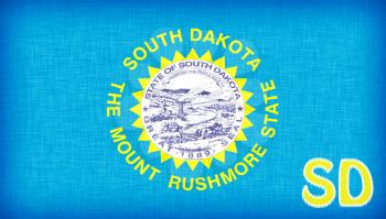 Linen flag of the US state of South Dakota with it's abbreviation stitched on it