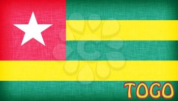 Linen flag of Togo with letters stiched on it