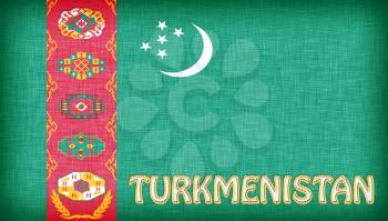 Linen flag of Turkmenistan with letters stitched on it